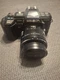 Minolta Maxxum 7000 AF 35mm SLR Film Camera with 50mm Macro Lens and Case