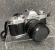 Canon AV-1 35mm SLR Film Camera w/ Canon FD 50mm f/1.8 Lens Tested Clean