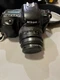Nikon N50 35mm film camera with 35-80mm lens - With body case and carrying bag