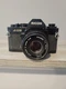 RICOH A100 CAMERA WITH 1:2 50MM LENSE. UNTESTED SOLD AS-IS!!
