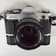 Canon AE-1 35mm SLR Film Camera with Canon 50mm f/1.8 FD Lens & Power Winder A