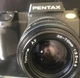 Pentax SF-10 sf 10 SLR camera with  Tokina 70mm uv
