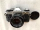 Canon AE-1 Program silver SLR 35mm Film Camera/Canon 50mm f/1.8 FD Lens - Tested