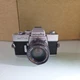 Minolta SRT102 with Rokkor-X 50mm f1.7 lens DENTED