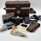 Pentax K1000 SE Black 35mm SLR Film Camera + SMC Pentax-M 50mm Lens Case Extras