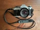 Canon AE-1 SLR Film Camera with 50mm and vintage camera bag - TESTED and WORKS